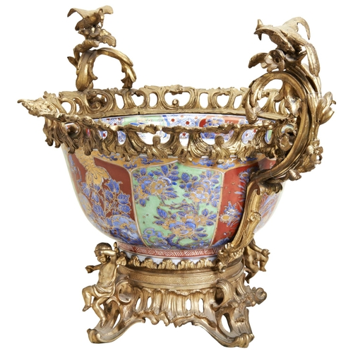 297 - A LARGE CHINESE IMARI PATTERN BOWL WITH ORMOLU MOUNTSPORCELAIN KANGXI PERIOD (1662-1722)the flared s... 