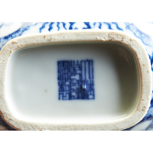 135 - A BLUE AND WHITE DOUBLE-GOURD 'DRAGON' VASE QIANLONG SEAL MARK, 19TH CENTURYof double-gourd form and... 