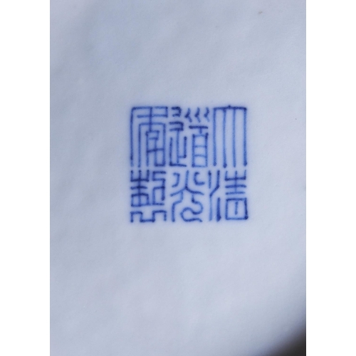 101 - A PAIR OF BLUE AND WHITE 'DRAGON' DISHESDAOGUANG SEAL MARKS AND OF THE PERIODthe interiors and exter... 