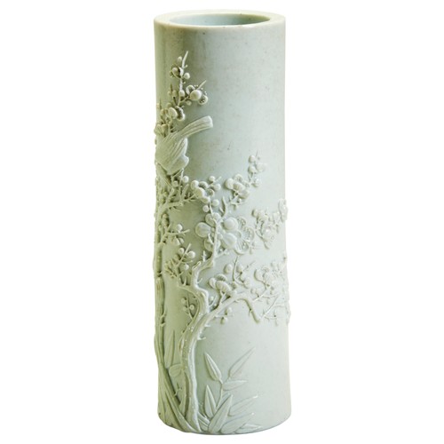 190 - A CARVED AND APPLIED BISCUIT VASELATE QING DYNASTYthe cylindrical vase modelled to simulate bamboo, ... 