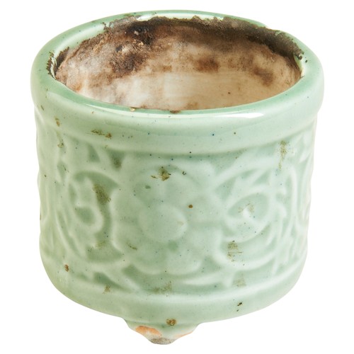 194 - A 'LONGQUAN' CELADON-GLAZED CENSERQING DYNASTY (1644-1911)the cylindrical sides carved with scrollin... 