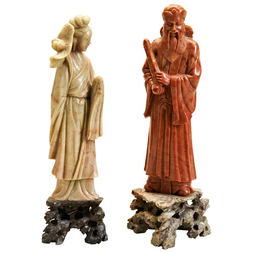 327 - TWO CHINESE SOAPSTONE CARVED FIGURES20TH CENTURYmodelled as a standing female and an official25cm &a... 