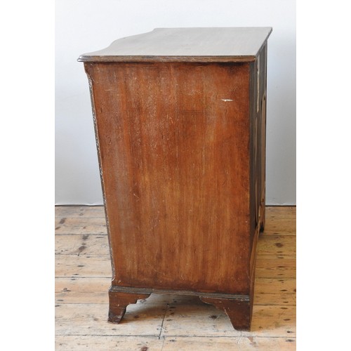 28 - A MAHOGANY SERPENTINE CHEST OF DRAWERS, CIRCA 1920, with a brushing slide above four graduated long ... 