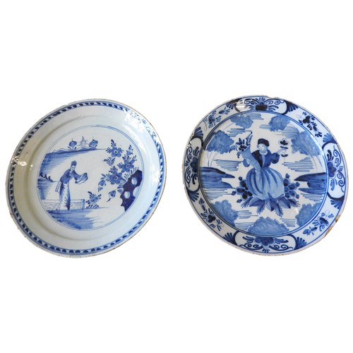 128 - TWO FIGURAL DECORATED DELFT BLUE & WHITE PLATES, 18TH CENTURY, one depicting a Chinese garden wi... 