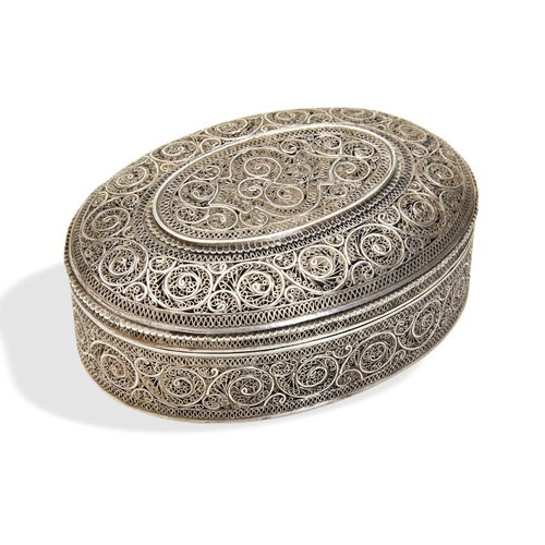 126 - AN OVAL SILVER FILIGREE PANDAN, DECCAN INDIA 18TH C. A good, heavy oval filigree box. Known as a pan... 