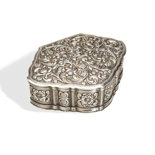 129 - A LARGE ESCUTCHEON SHAPE BOX, SRI LANKA C.1880. An unusually finely chased box in typical Sri Lanka ... 