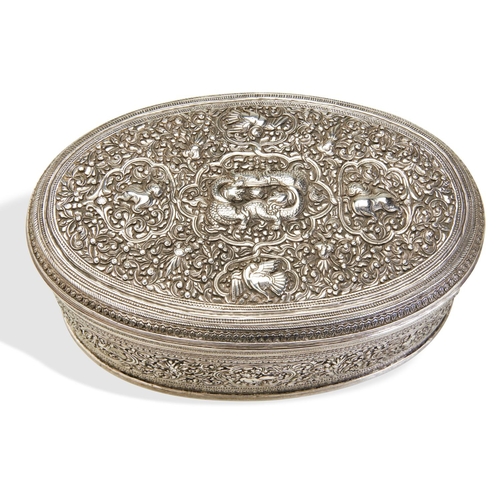 130 - A LARGE SILVER PANDAN, SHAN STATES C.1880. A finely chased pandan from south Burma. On a much larger... 