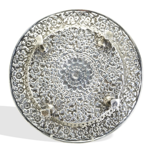 132 - A SILVER SALVER ON FOUR FEET, KUTCH INDIA, C.1850. The reverse of the salver bears the inscription 