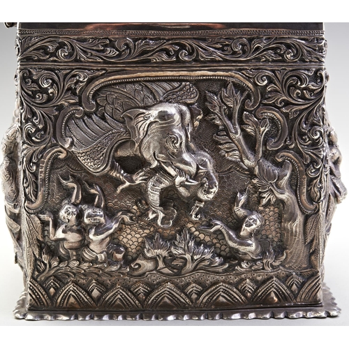 142 - A BURMESE SILVER CASKET C.1880. A very finely chased casket with a lockable drop in wooden liner. Th... 