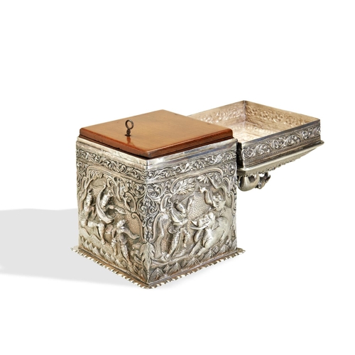 142 - A BURMESE SILVER CASKET C.1880. A very finely chased casket with a lockable drop in wooden liner. Th... 