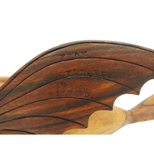 406 - A VINTAGE CARVED SOUVENIR FLYING FISH, CIRCA 1950, carved from Miro wood by inhabitants of Pitcairn ... 