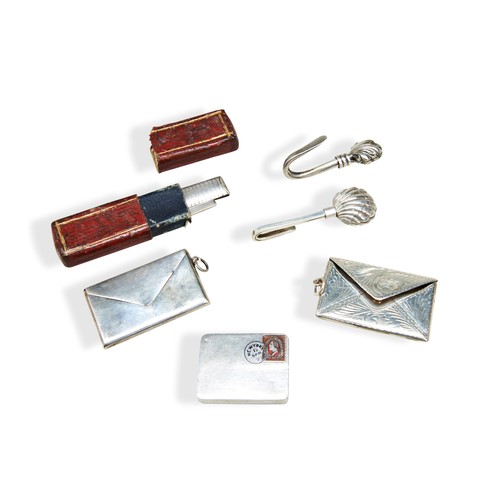 242 - THREE SILVER STAMP PURSES, TWO SILVER NAPKIN CLIPS AND A SILVER POCKET KNIFE, the knife with a mothe... 