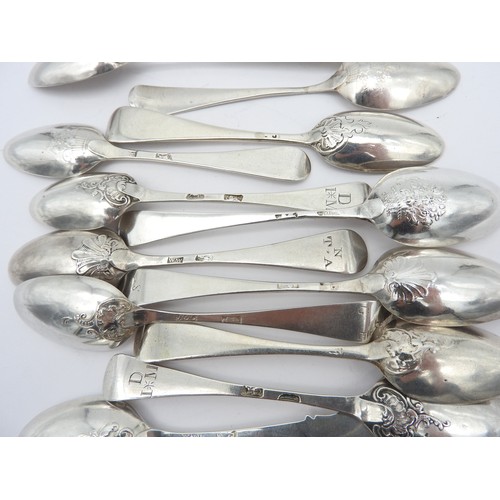 259 - AN ASSORTMENT OF TWELVE SCROLL BACK SILVER TEASPOONS, late 18th / early 19th century, including thre... 