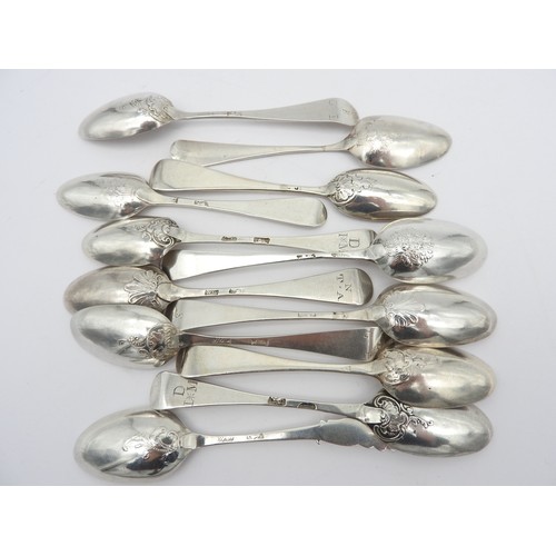 259 - AN ASSORTMENT OF TWELVE SCROLL BACK SILVER TEASPOONS, late 18th / early 19th century, including thre... 