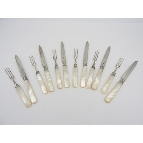 267 - A SET OF SIX SILVER MOTHER OF PEARL HANDLED FRUIT KNIVES AND SIX MATCHING FORKS, with scroll foliate... 