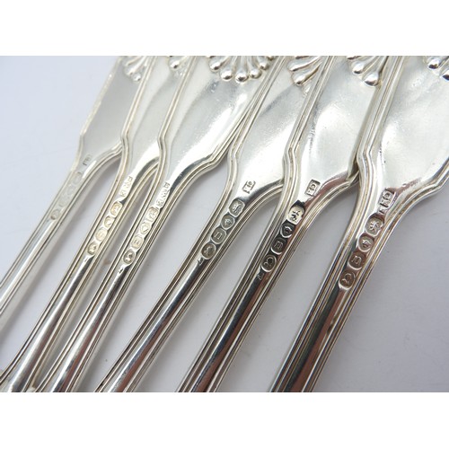 295 - A SET OF SIX GEORGE IV TABLE FORKS, fiddle pattern with shell decoration and engraved turret insigni... 