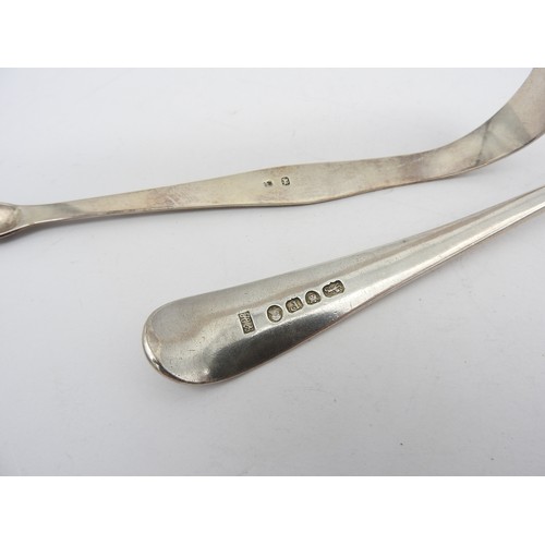 269 - A PAIR OF GEORGE III SILVER SUGAR TONGS AND A TABLESPOON, BOTH BY HESTER BATEMAN, the pair of tongs ... 