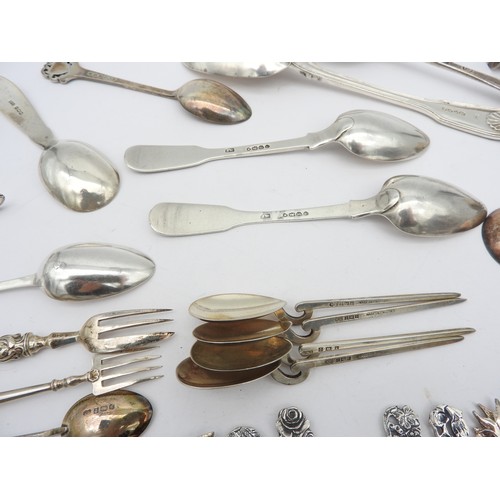 253 - A LARGE ASSORTMENT OF 18TH AND 19TH CENTURY SILVER FLATWARE, including a rat tail table spoon (Thoma... 