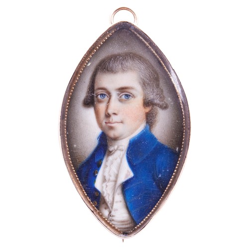 455 - ATTRIBUTED TO JAMES SCOULER, CIRCA 1780, PORTRAIT OF A GENTLEMAN IN A BLUE COAT in an elliptical yel... 