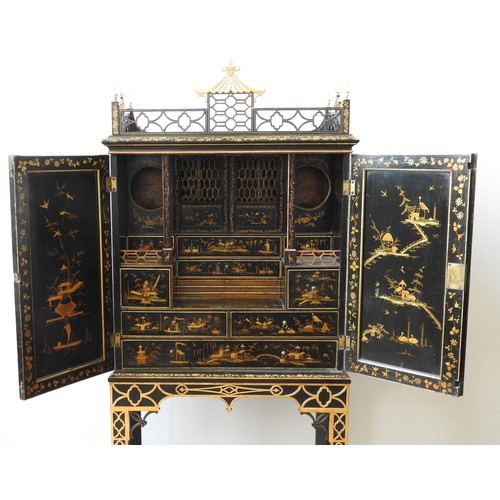 70 - A FINE GEORGE III PAINTED CABINET ON STAND, in the Chinese Chippendale manner, the fret pierced 'pag... 