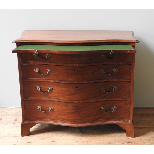 43 - A GEORGE III BACHELOR'S MAHOGANY CHEST OF DRAWERS, CIRCA 1820, elegant serpentine form, the shaped t... 