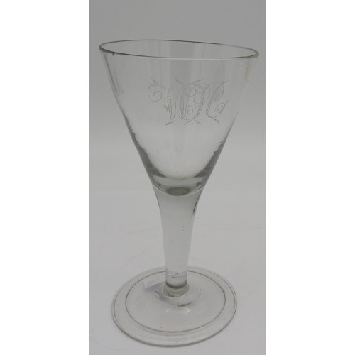 116 - A GEORGE III LARGE WINE GOBLET, CIRCA 1820, the drawn trumpet bowl etched with the initials 'W.J.C',... 