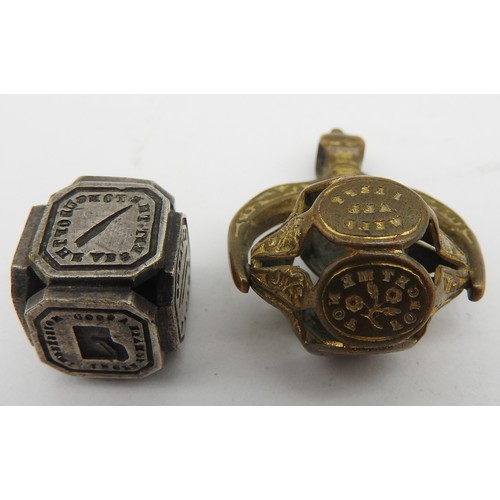 358 - AN EARLY VICTORIAN SPINNING INTAGLIO FOB SEAL AND A CUBE FORM INTAGLIO SEAL, CIRCA 1850, the spinnin... 