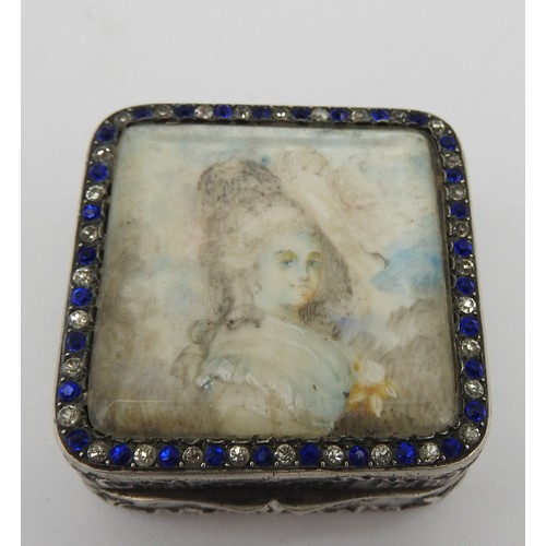 237 - A VINTAGE FRENCH WHITE METAL PILL BOX, square form, the hinged lid decorated with a portrait paintin... 