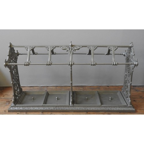 78 - AN IMPRESSIVE VICTORIAN CAST-IRON STICK STAND, CIRCA 1880, three cruciform panels united by a centra... 