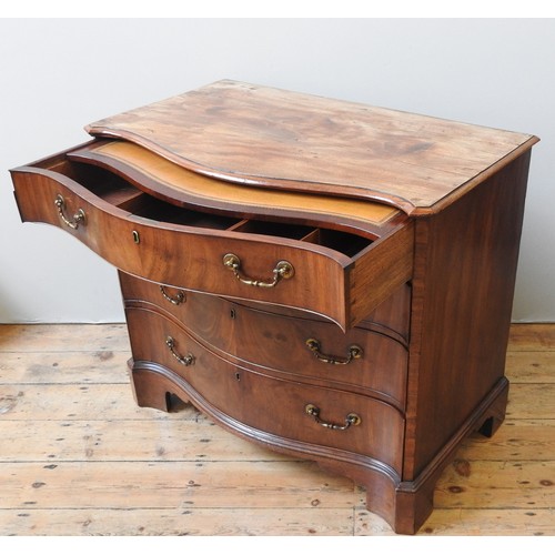 69 - A FINE GEORGE III SERPENTNE CHEST OF DRAWERS, CIRCA 1780, shaped moulded edge top over four long gra... 