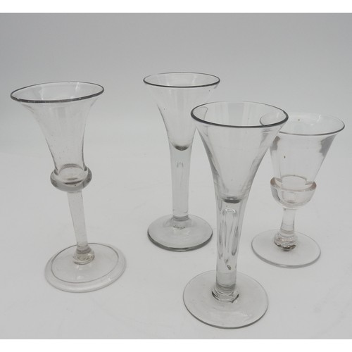 114 - A GEORGE III CORDIAL GLASS WITH TRUMPET SHAPE BOWL,the stem with teardrop shape inclusion, another s... 