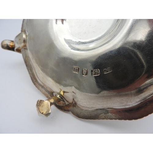 268 - A GEORGE III SILVER CHAMBERSTICK, circular scroll edge form with gadrooned edge, with detachable snu... 