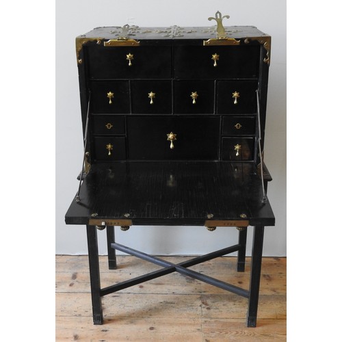 50 - A 19TH CENTURY BRASS BOUND FALL FRONT CABINET, the ebonised cabinet with heavy duty brass strappings... 