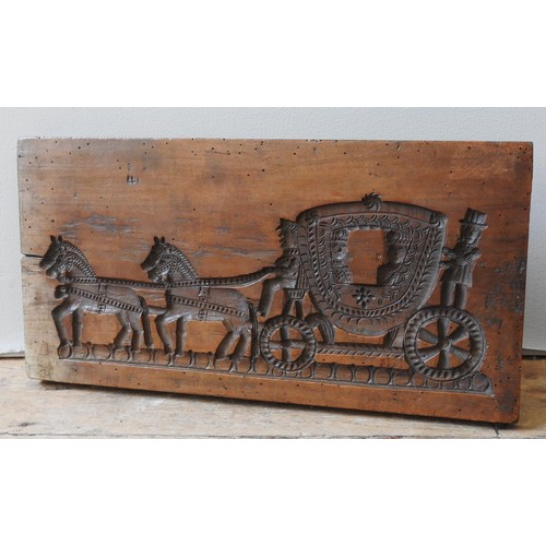 408 - A DUTCH 18TH CENTURY FRUITWOOD GINGERBREAD MOULD, one side carved with royal horse drawn carriage sc... 