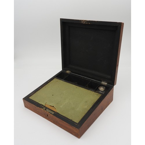 214 - A REGENCY PENWORK WRITING SLOPE, the hinged lid with central cartouche illustrated with printed Neoc... 