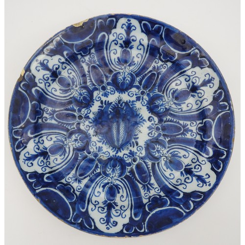 125 - A LARGE DELFT BLUE AND WHITE PLATE, LATE 18TH / EARLY 19TH CENTURY, central reserve with fruit baske... 