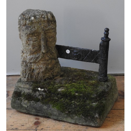 79 - AN UNUSUAL GEORGIAN BOOT SCRAPER, CIRCA 1780, diamond and rosette decorated cast-iron bracket mounte... 