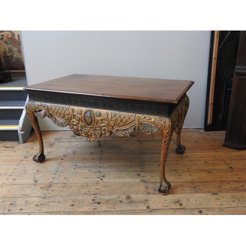 53 - A MID 19TH CENTURY MAHOGANY AND GILT WOOD CENTRE TABLE, the shape and proportions in the Chippendale... 