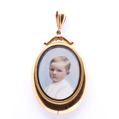 431 - ENGLISH SCHOOL, EARLY 20TH CENTURY MINIATURE PORTRAIT OF A YOUNG BOY in a yellow metal frame. (Untes... 