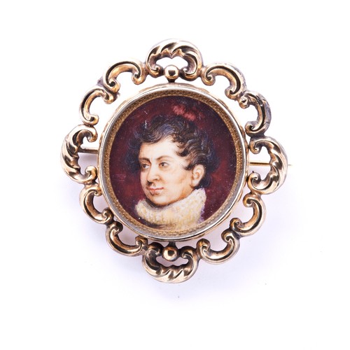 435 - ENGLISH SCHOOL, REGENCY MINIATURE PORTRAIT OF A GENTLEMAN in a fancyPinch-beck brooch mount with gla... 