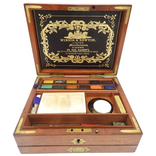 219 - A 19TH CENTURY WINDSOR AND NEWTON MAHOGANY ARTIST'S BOX , CIRCA 1870, the hinged lid inset with bras... 