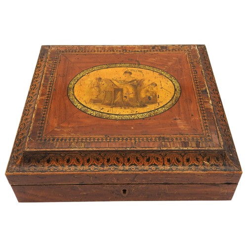 214 - A REGENCY PENWORK WRITING SLOPE, the hinged lid with central cartouche illustrated with printed Neoc... 