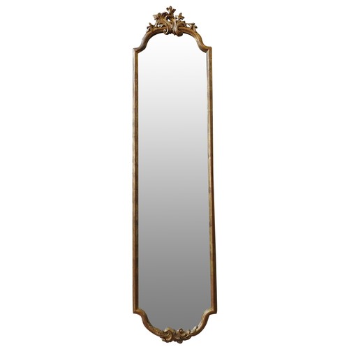 89 - A 19TH CENTURY GILTWOOD FRAMED MIRROR, of slender prorportions with bevelled plate, the arched top a... 