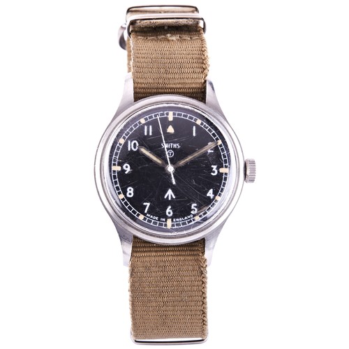 332 - SMITHS, A MILITARY WRISTWATCH, the black dial signed Smiths. Made in England with tritium and MOD lo... 