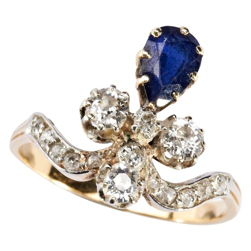 307 - AN ART NOUVEAU SAPPHIRE AND DIAMOND RING, CIRCA 1900the pear-cut sapphire eight claw set below a tre... 