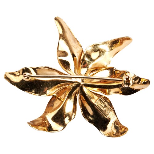 279 - TIFFANY; A 14 CARAT GOLD FLOWER BROOCHthe Orchid with textured leaves.Marked Tiffany & Co '14K' ... 