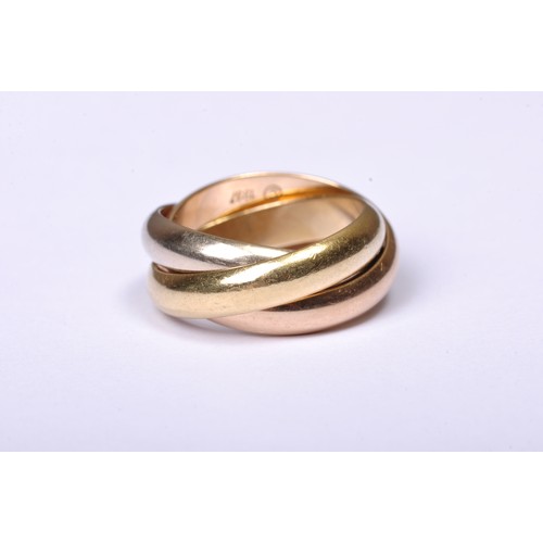 285 - CARTIER; A TRINITY RINGof white, yellow and rose gold polished bands.Marked 'C' 1997Total weight 11g... 