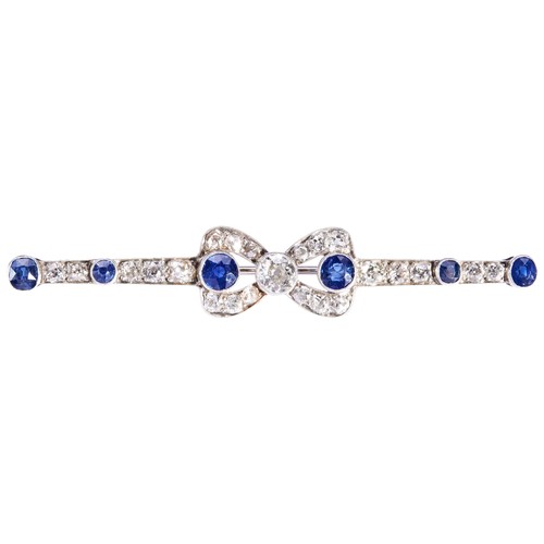 308 - A SAPPHIRE AND DIAMOND BROOCH, CIRCA 1900the old brilliant-cut diamonds collet set between two simil... 