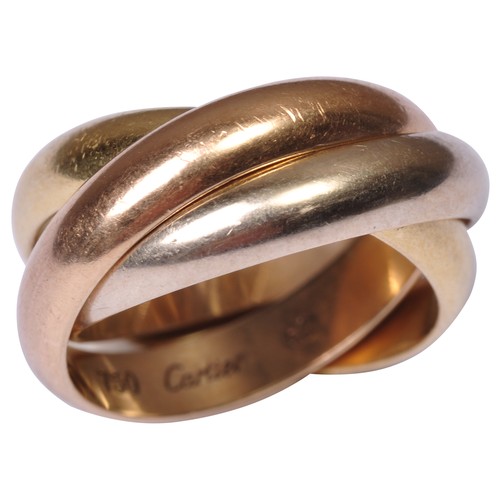 285 - CARTIER; A TRINITY RINGof white, yellow and rose gold polished bands.Marked 'C' 1997Total weight 11g... 