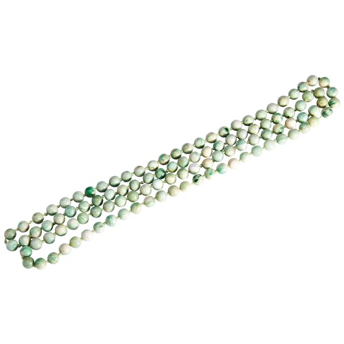 301 - A JADEITE NECKLACEof one hundred and twelve beads on knotted silk, each bead measures 9.7mmTotal wei... 